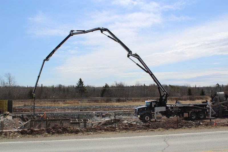 Pouring a foundation with a pump truck in Enfield, Nova Scotia